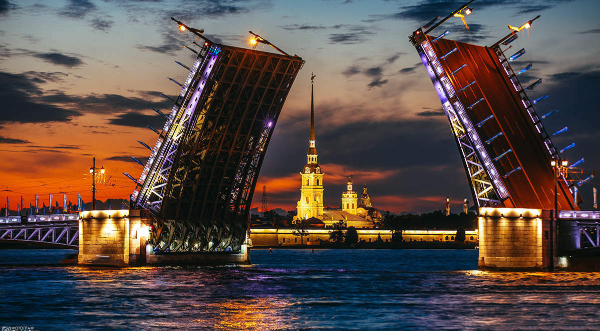 Open bridge at night with Peter and Paul Fortress in Saint Petersburg Russia