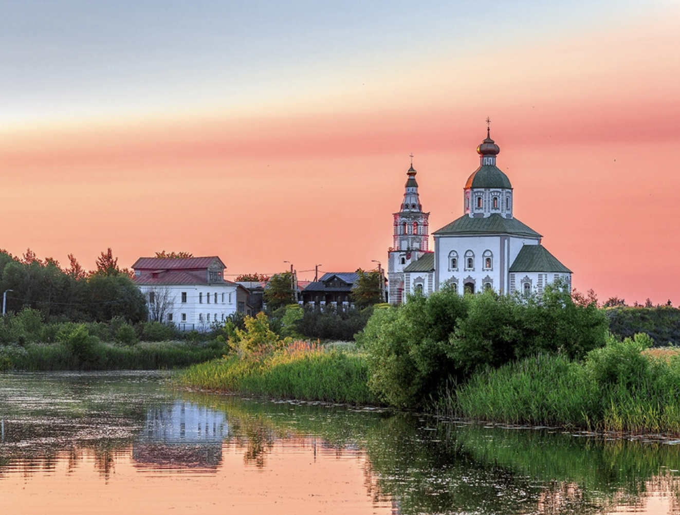 Suzdal View from the Kamenka River Scenic view of Suzdal from the Kamenka River, with historic churches and traditional Russian architecture
